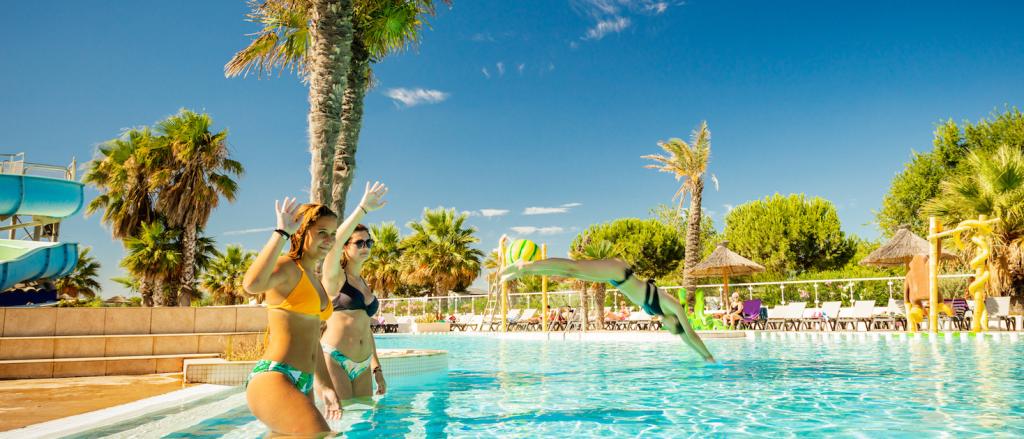 Two people in pool at Siblu Le Marisol